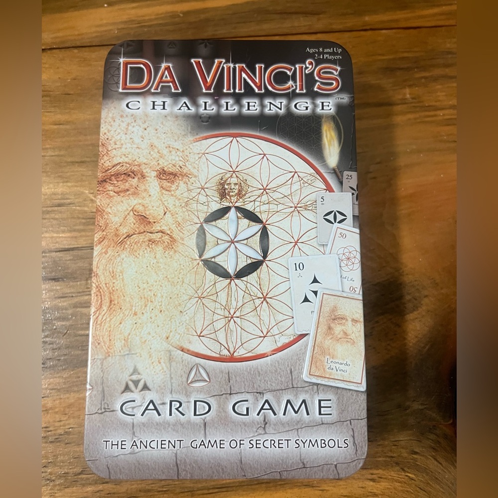 Da Vinci's Challenge Card Game,  The Ancient Game of Secret Symbols  NEW/ in TIn